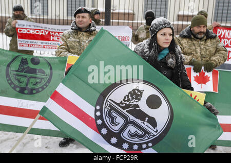 Kiev, Ukraine. 23rd Jan, 2016. Activists from Ukrainian voluntary battalions 'Georgia national legion' Chechen battalion named of Dzhokhar Dudayev, and their supporters during protest against the politics of Russian President Vladimir Putin, in front the Russian Embassy. © Vasyl Shevchenko/Pacific Press/Alamy Live News Stock Photo