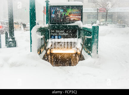 New York, USA. 23rd Jan, 2016. Subway entrance at Penn Station in Midtown Manhattan, New York City during blizzard storm Jonas. January 23, 2016. Credit:  Brigette Supernova / Outer Focus Photos/Alamy Live News Stock Photo
