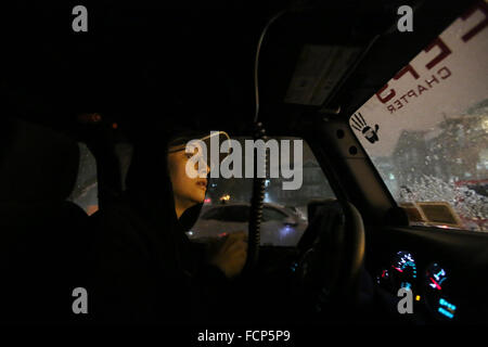 Staten Island, NY, USA. 23rd Jan, 2016. Wicked Jeep driver Nicole Fioretto waits outside of Staten Island University Hospital to pick up medical staff getting off of their shifts during Winter Storm Jonas. During the blizzard, five Wicked Jeep drivers volunteered their time to pick up Staten Island residents and shuttle them safely to their destination. Late afternoon city buses ceased to run on the island, and a New York City travel ban was later enforceable by the NYPD. This lack of transportation stranded many residents of Staten Island who had taken the ferry home, or needed to get to Man Stock Photo