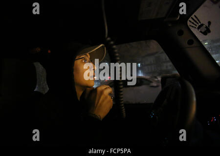 Staten Island, NY, USA. 23rd Jan, 2016. Wicked Jeep driver Nicole Fioretto waits outside of Staten Island University Hospital to pick up medical staff getting off of their shifts during Winter Storm Jonas. During the blizzard, five Wicked Jeep drivers volunteered their time to pick up Staten Island residents and shuttle them safely to their destination. Late afternoon city buses ceased to run on the island, and a New York City travel ban was later enforceable by the NYPD. This lack of transportation stranded many residents of Staten Island who had taken the ferry home, or needed to get to Man Stock Photo