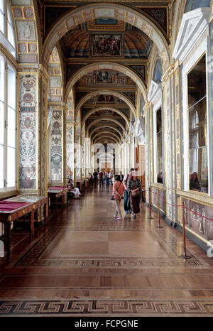 View along a long corridor (the Raphael Loggias) inside the State Hermitage museum, St Petersburg, Russia.