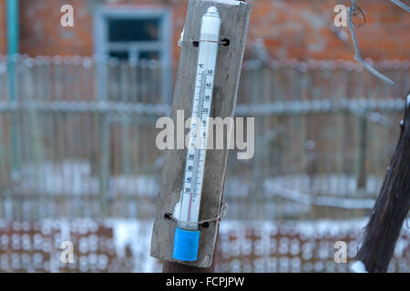 Old alcohol thermometer shows the temperature of -49 degrees Celsius Stock Photo