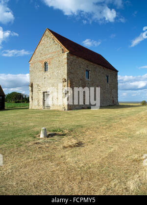 Looking NE at the nave of St Peter's 7th-century chapel, Bradwell-on-Sea, built of reused Roman materials on the gateway of Othona Roman fort. Stock Photo