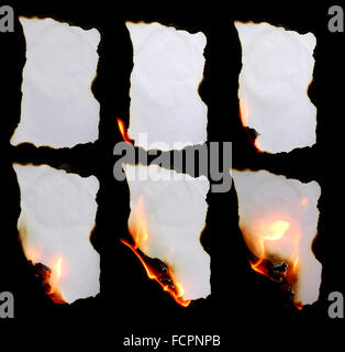 burning paper in dark background Stock Photo