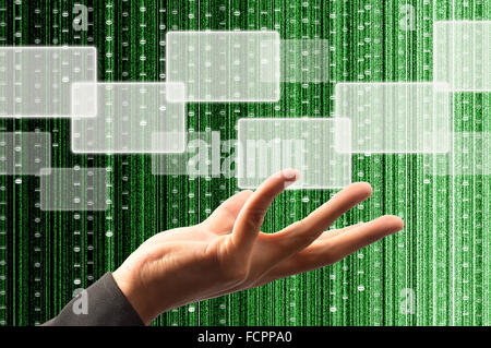 hand hold a touch screen interface with digital matrix background Stock Photo