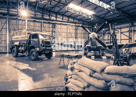 A recreated scene from world war two of an active Spitfire hangar as the aircraft is refuelled. Stock Photo