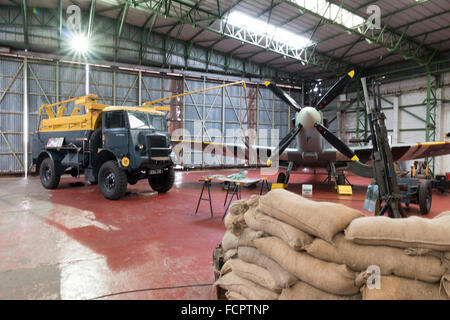 A recreated scene from world war two of an active Spitfire hangar as the aircraft is refuelled. Stock Photo