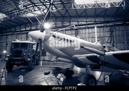 A recreated scene from world war two of an active Spitfire hangar as the aircraft is refuelled. Stock Photo