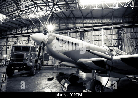 A recreated scene from world war two of an active Spitfire hangar as the aircraft is refuelled. Stock Photo