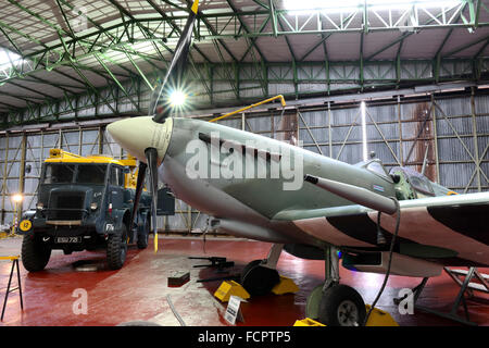 A recreated scene from world war two of an active Spitfire hangar as the aircraft is refuelled. Stock Photo