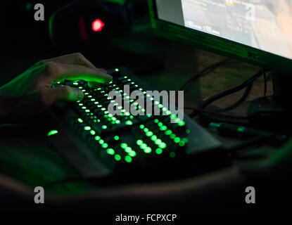 A dimly illuminated computer keyboard at NetGame, Switzerland's largest computer game convention. Stock Photo