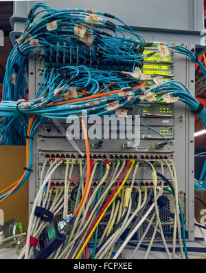 Computer network router / switch with LAN cables Stock Photo