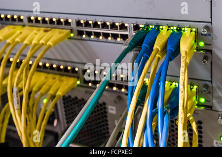 Computer network router / switch with LAN cables Stock Photo