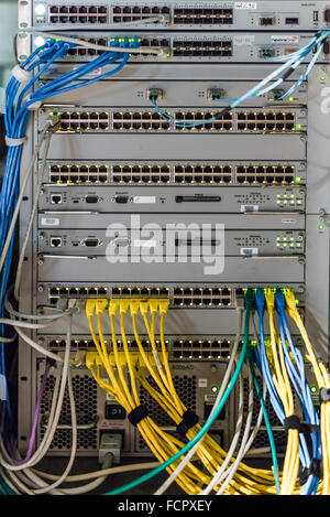 Computer network router / switch with LAN cables Stock Photo