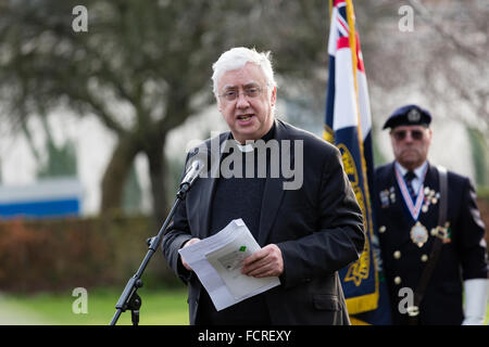 Romford, Essex, UK. 24th Jan 2016. Reverend Mike Power from St Edward the Confessor church speaking at a commemorative service in Coronation Gardens, Romford to commemorate Holocaust Memorial Day which falls on 27th January 2016. Credit:  London pix/Alamy Live News Stock Photo