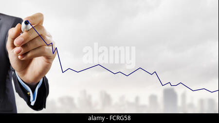 Hand of businessman drawing with pencil increasing graph Stock Photo ...