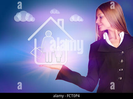 woman showing holding on mom and children in house. Stock Photo