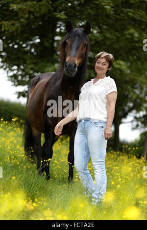 woman and Paso Peruano Stock Photo