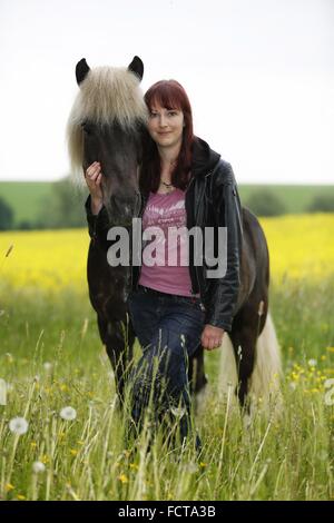 woman and Icelandic horse Stock Photo