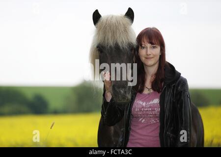 woman and Icelandic horse Stock Photo