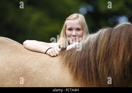 woman and Icelandic horse Stock Photo