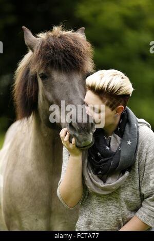 woman and Icelandic horse Stock Photo