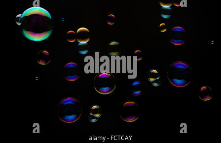 Soap bubbles on a black backgound for overlay use Stock Photo