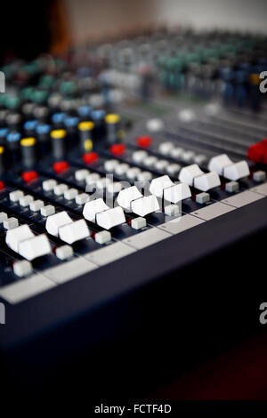 Detail with adjusting knobs on a professional audio mixer Stock Photo