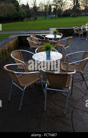 Outdoor tables and chairs in the rain. Stock Photo