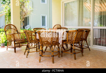 Garden furniture on the summer terrace Stock Photo