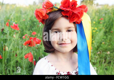 Smiling Girl on in Wreath with Yellow and Blue (Ukrainian Flag Colors) Ribbons Stock Photo