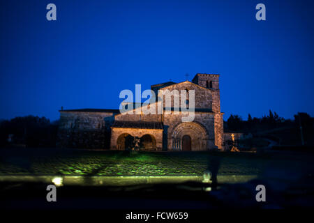 Cantabria, Spain. 24th Jan, 2016. The Church of Santa Cruz in Castañeda (Cantabria) illuminated at dusk, This collegiate church is a jewel of Romanesque style of the twelfth century and was esta and Declared a national monument in 1930 Credit:  JOAQUIN GOMEZ SASTRE/Alamy Live News Stock Photo