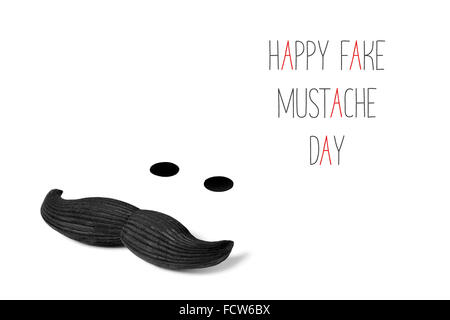 a mustache and two dots simulating eyes, and the text happy fake mustache day in black and red on a white background Stock Photo