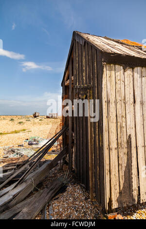 Abandoned fishing hut on the shingle beach in Dungeness, Kent, England Stock Photo