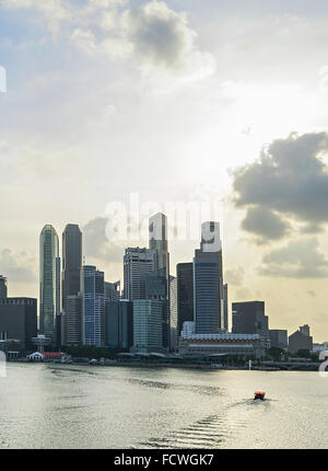 Skyline of Singapore bay with famous Downton Core at sunset. Stock Photo