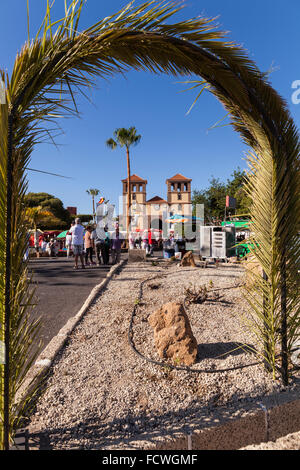 Palm leaf arch at the plaza in front of the new church at La Caleta for the annual San Sebastian fiesta, Costa Adeje, Tenerife, Stock Photo