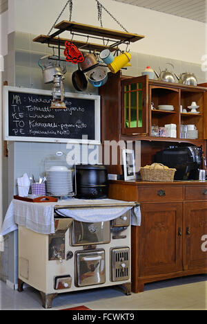Part of the kitchen interior in a small cafe in the center of the Finnish town of Heinola. Stock Photo