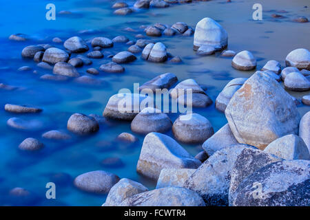 rocks and shore line along Sand Harbor at dusk, Lake Tahoe, USA Stock Photo