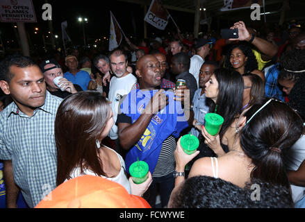 Port of Spain, Trinidad. 24th January, 2016. Keith Christopher Rowley (C), Prime Minister of Trinidad & Tobago, visits the North Stand at the semi-finals of Panorama in the Queen's Park Savannah during Carnival in Port of Spain, Trinidad on Sunday January 24, 2016. (Photo by Sean Drakes/Alamy Live News) Stock Photo