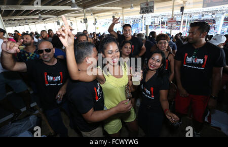 Port of Spain, Trinidad. 24th January, 2016. People party in the festive North Stand at the semi-finals of Panorama in the Queen's Park Savannah during Carnival in Port of Spain, Trinidad on Sunday January 24, 2016. (Photo by Sean Drakes/Alamy Live News) Stock Photo
