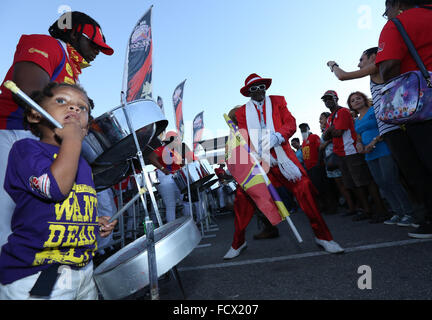 Port of Spain, Trinidad. 24th January, 2016. Members of NGC Steel Xplosion Steel Orchestra performs at the semi-finals of Panorama in the Queen's Park Savannah during Carnival in Port of Spain, Trinidad on Sunday January 24, 2016. (Photo by Sean Drakes/Alamy Live News) Stock Photo