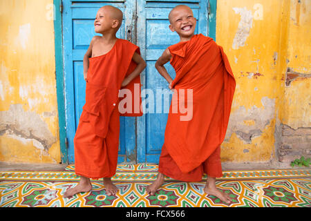 Buddhist monks having fun at the monastery in Battambang, Cambodia Stock Photo
