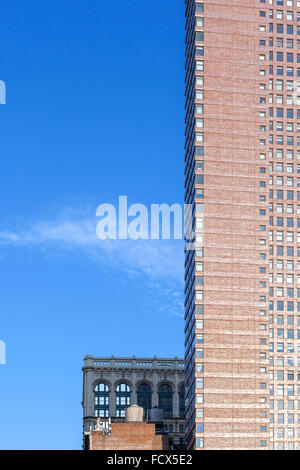 Highrise apartment in New York against blue sky, space for text Stock ...