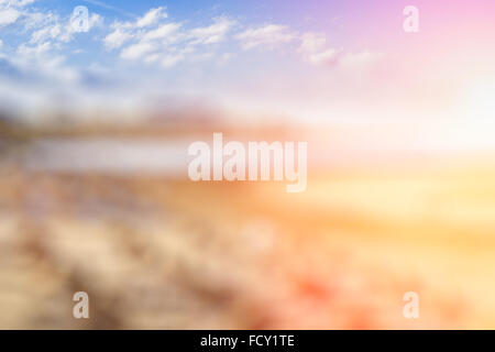 Blurred background with Sunny tropical beach. Tourist abstraction with bokeh. A background substrate for beach travel Stock Photo