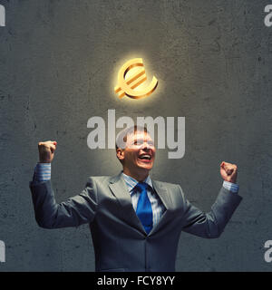 Successful businessman screaming in sky. Money concept Stock Photo