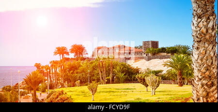 TENERIFE, SPAIN - JANUARY 14, 2013: Plaza Playa del Duque, view of the Duke Castle (El Duque Castle), Costa Adeje, Tenerife Stock Photo