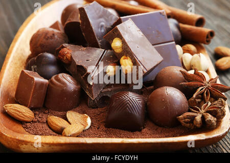 Chocolate pralines and tablet with cocoa,nuts and anise Stock Photo