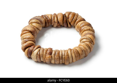 Traditional threaded Moroccan dried figs on white background Stock Photo