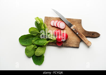 Fresh red radish isolated on a white background close up. Stock Photo