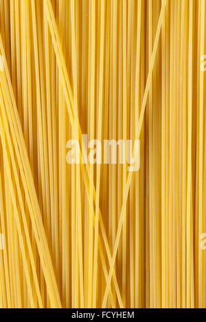 Raw dried traditional Italian spaghetti full frame Stock Photo